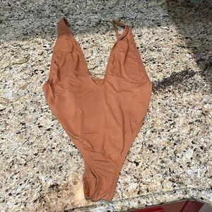 Dippin daisy’s one piece, size medium